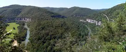 Forested Ozark hills and limestone bluffs along the Buffalo National River at Steel Creek, Arkansas