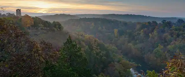 Forested Ozark hills in autumn at sunrise at Ha Ha Tonka State Park, Missouri